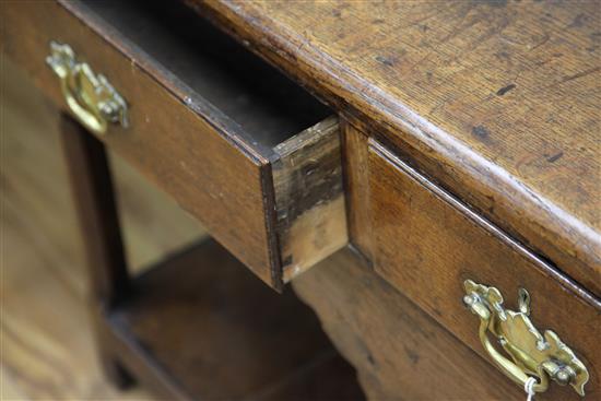 An 18th century oak dresser, W.5ft 1in. H.6ft 5in.